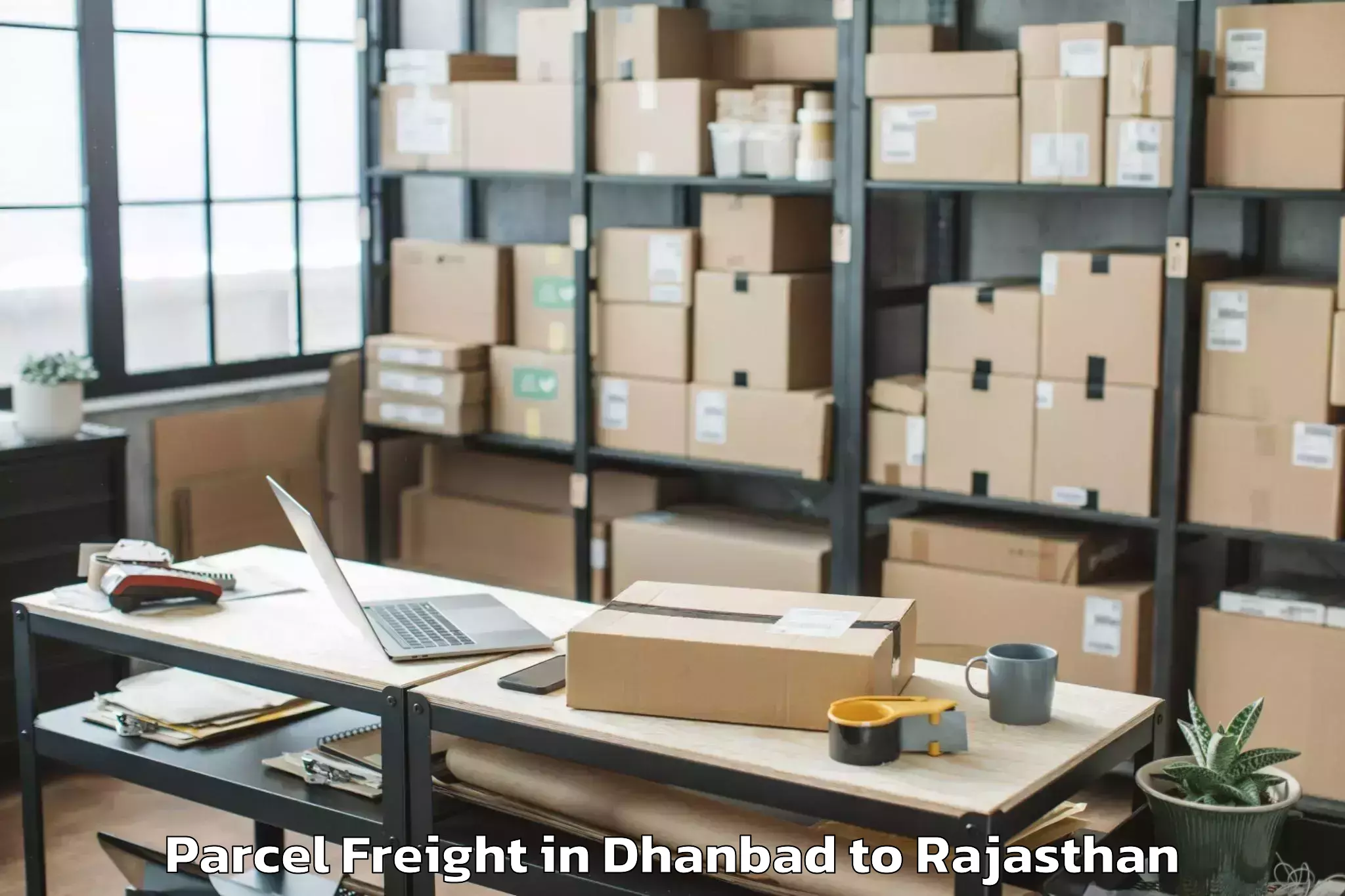 Leading Dhanbad to Sheoganj Parcel Freight Provider